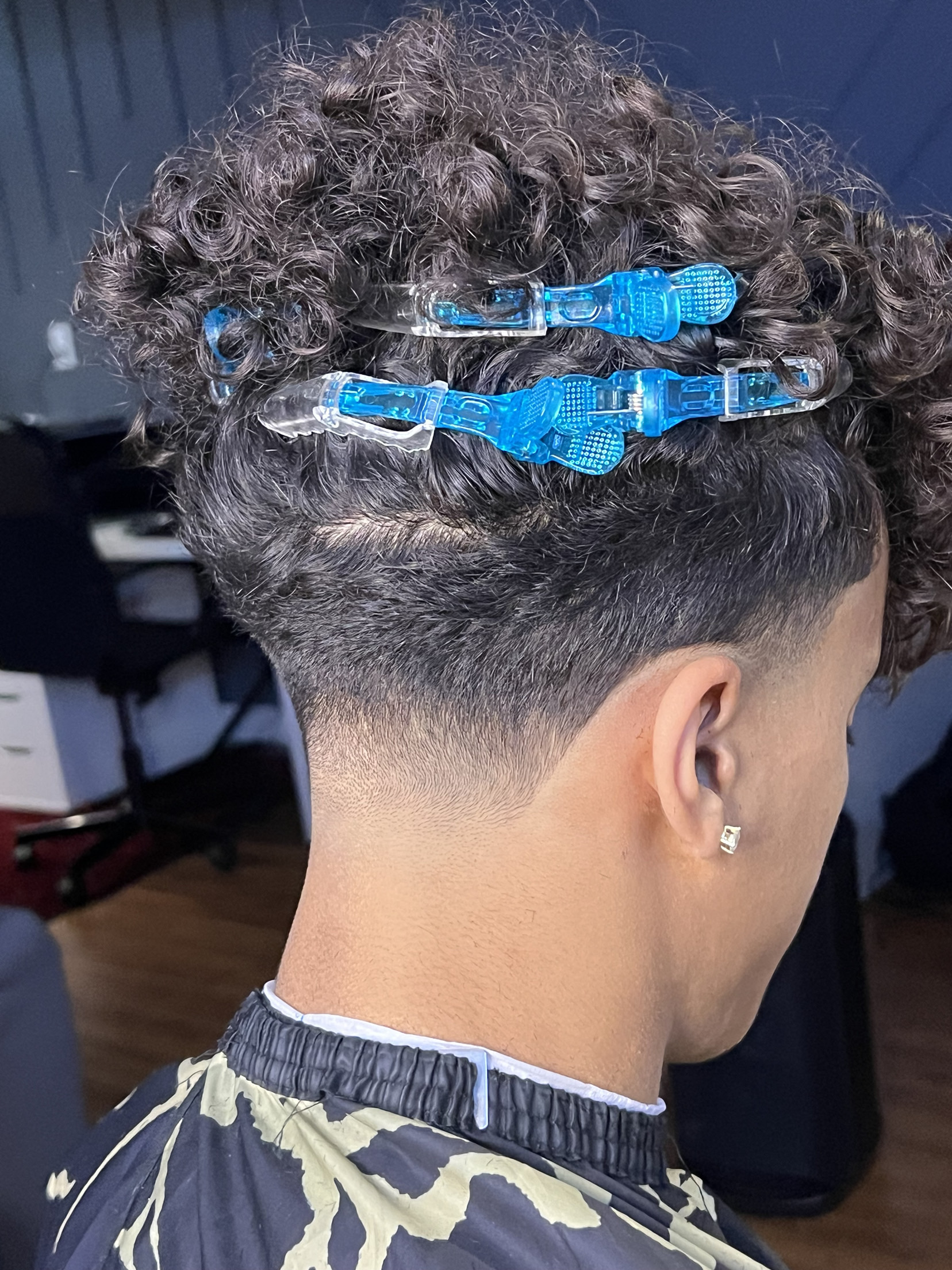 Sectioning curly hair before a cut